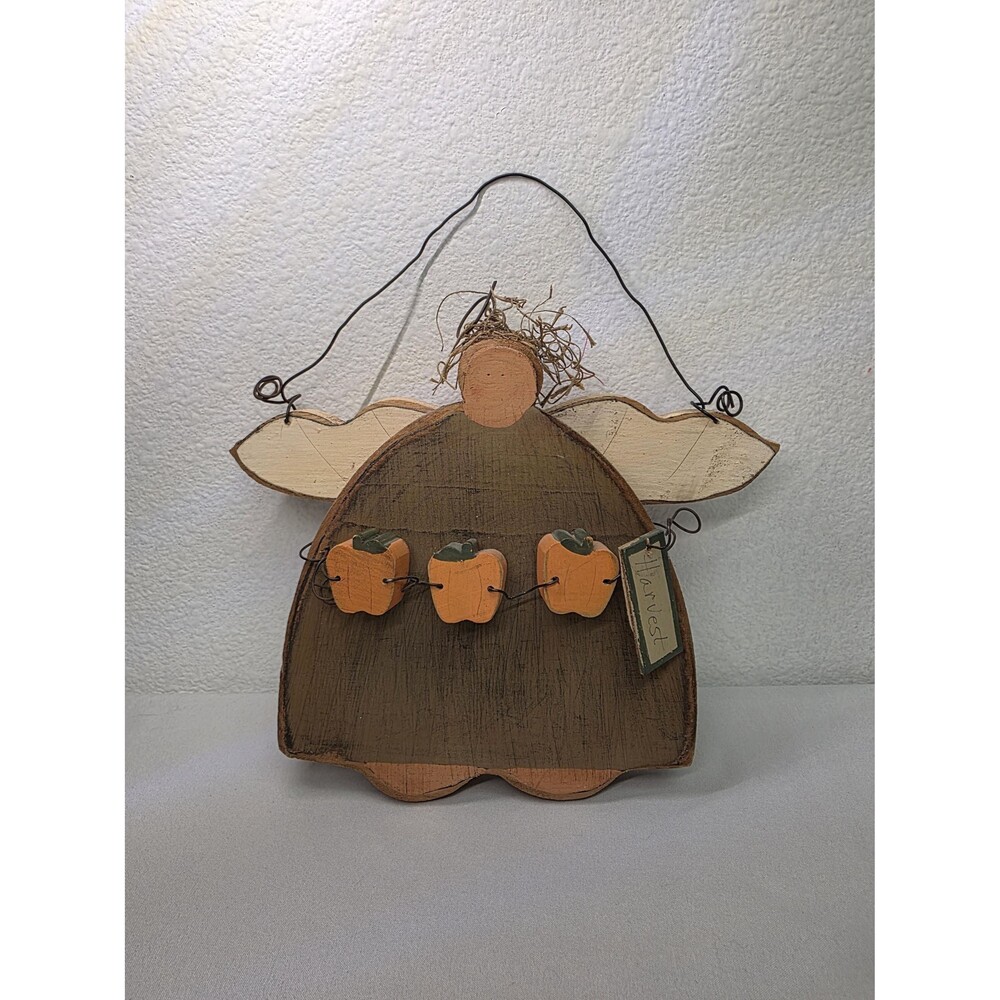 Vintage wooden Handmade Halloween hanging harvest angel holding pumpkins folk